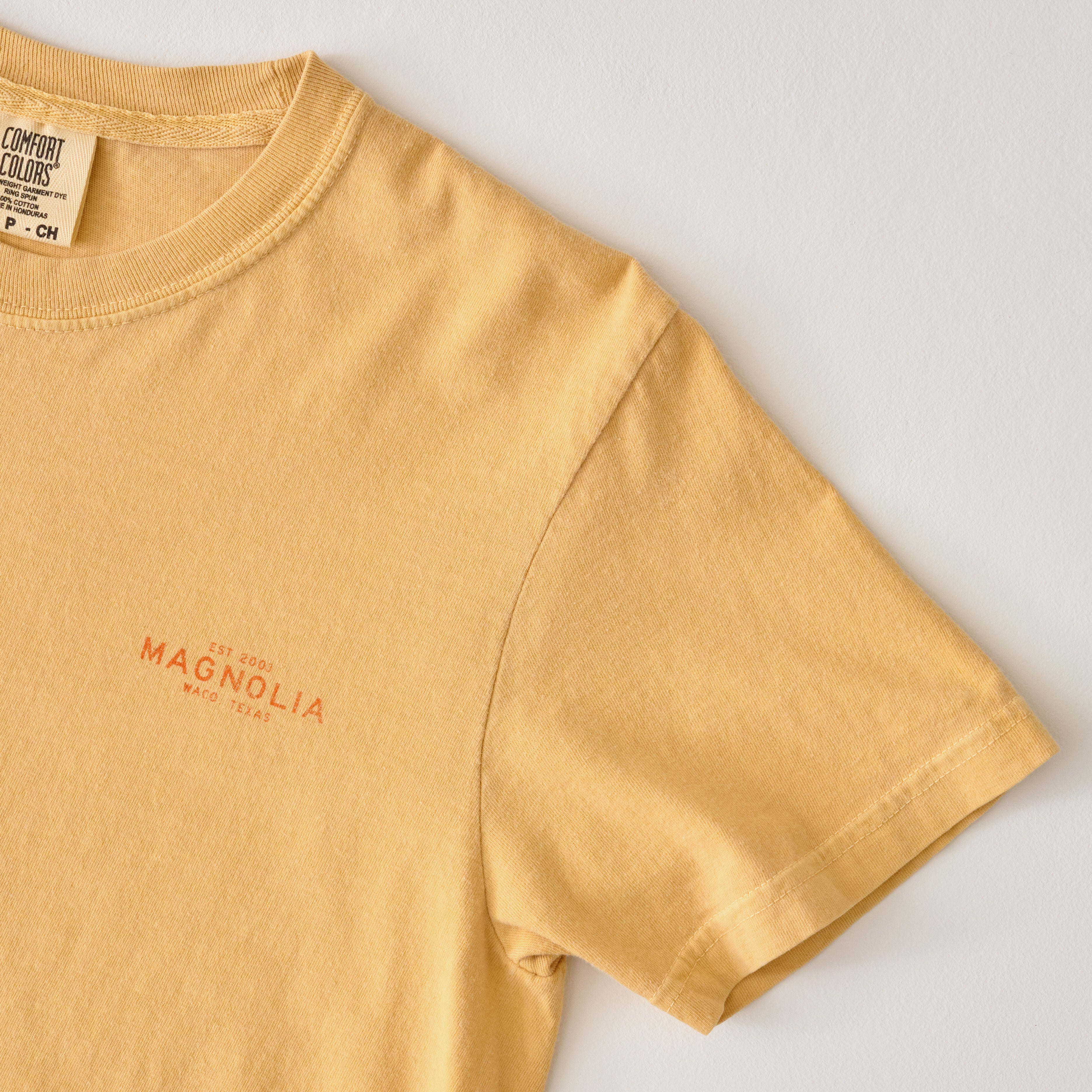 Magnolia Katy Ballpark Mustard Crest Tee