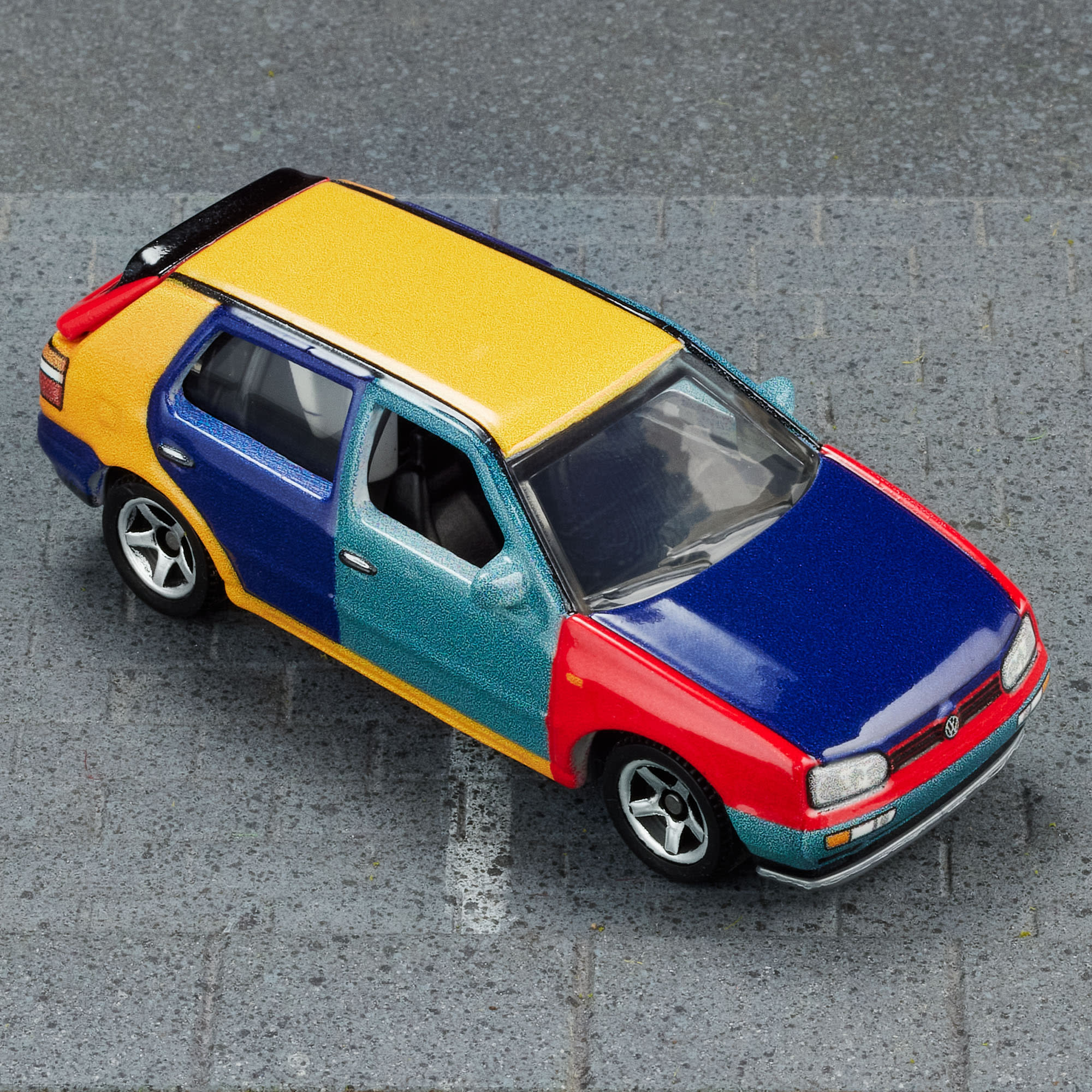 Mattel Creations Matchbox 1995 Volkswagen Golf Harlequin